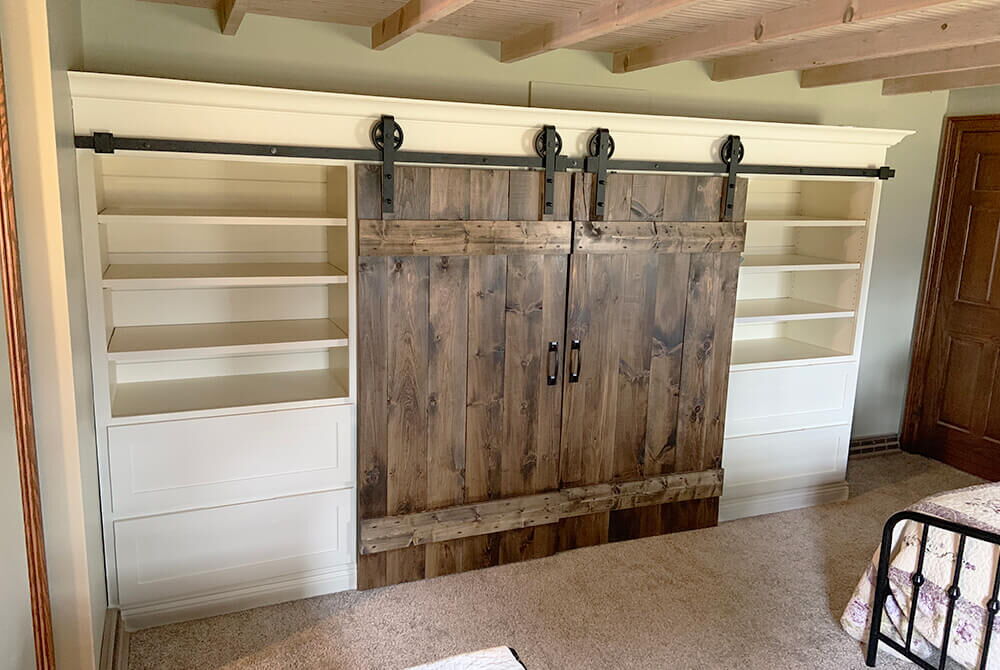 interior space with brown sliding barn doors