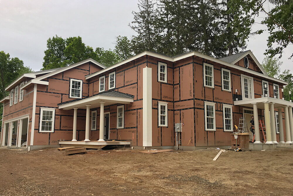 outside view of two story partially finished house