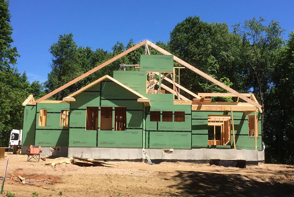 Partially completed new home construction, two story house